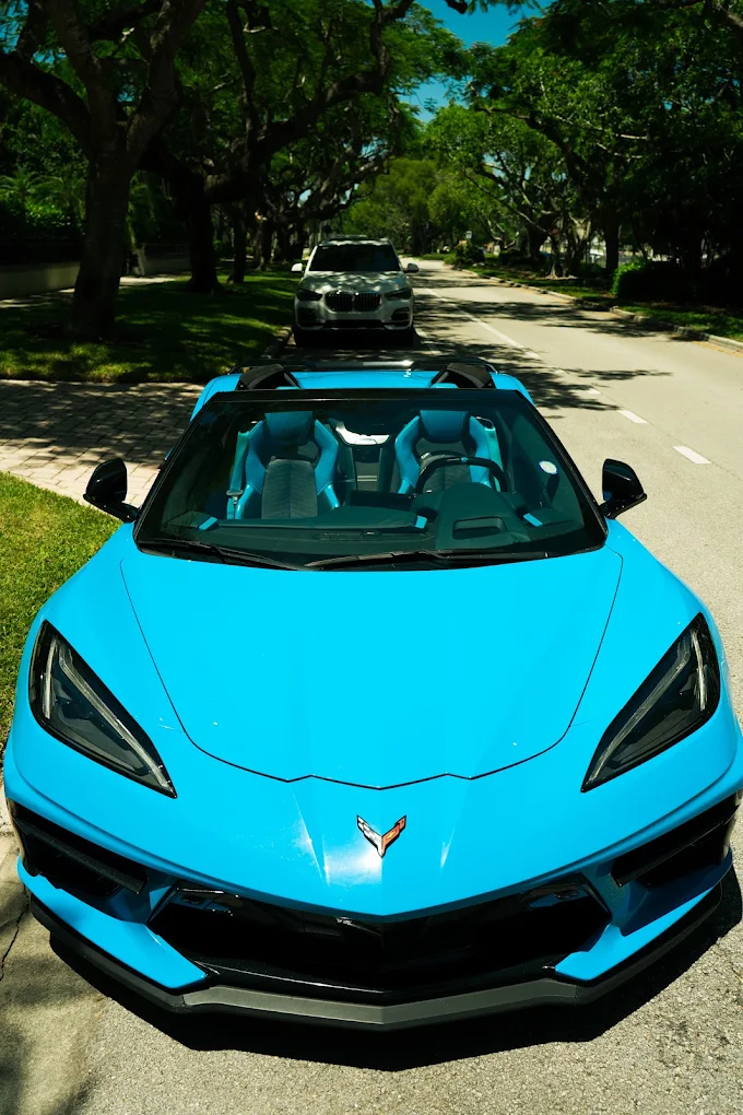 Turquoise Chevrolet Corvette C8, overhead front view